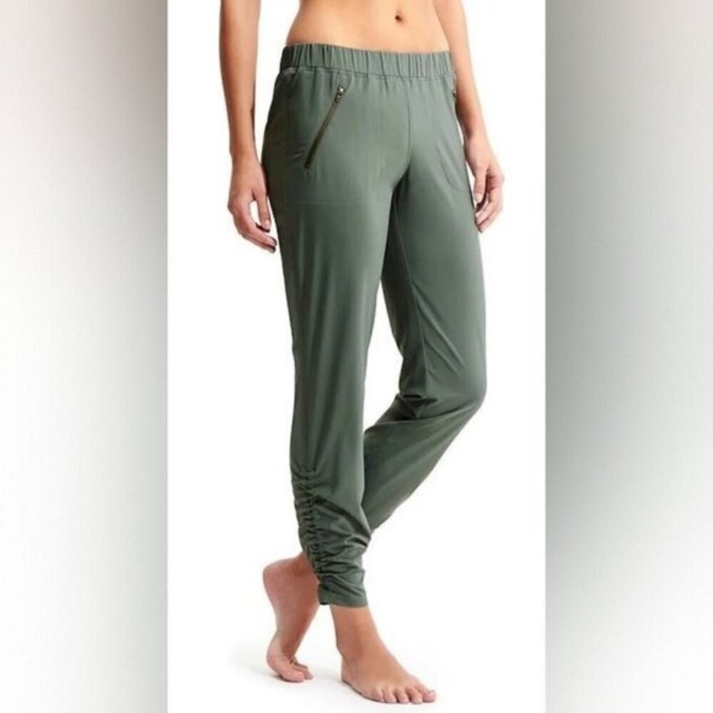 Athleta Aspire Ankle Joggers Womens Size 0 Green Zip Pocket Stretch Travel Pants